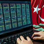 ** A data breach incident unfolding on a computer screen, with Turkish Lira symbols cascading down, illustrating financial loss due to cybercrime in Turkey.

**